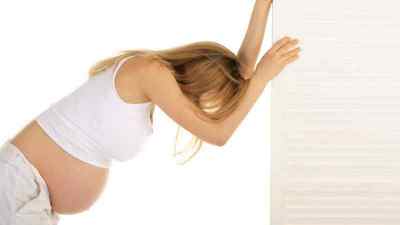 Болить поперек при вагітності на ранньому терміні, у другому і третьому триместрі: мазі і вправи, що робити якщо тягне спину | Ревматолог
